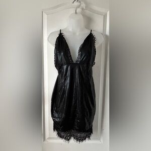 Sleek Black Lace-Trimmed Dress